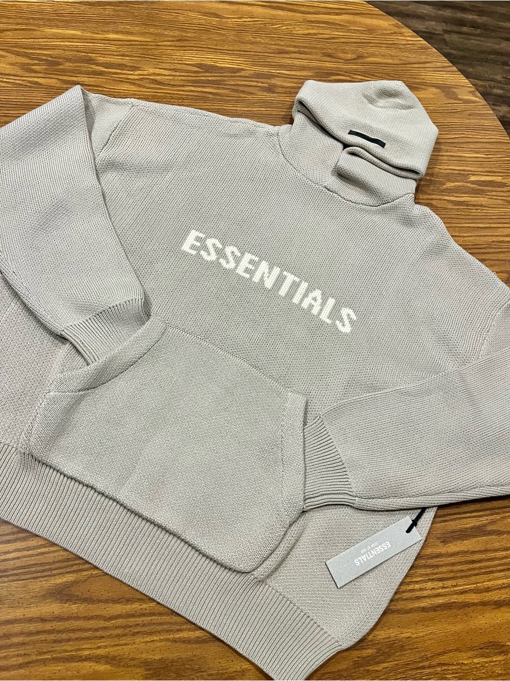 Fear of God ESSENTIALS Knitted Hoodie Oatmeal Large with white print